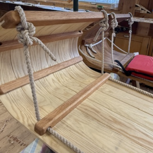 Finished Carpenter's Boat Shop toboggans, primed for their next-day downhill competition. Courtesy photo