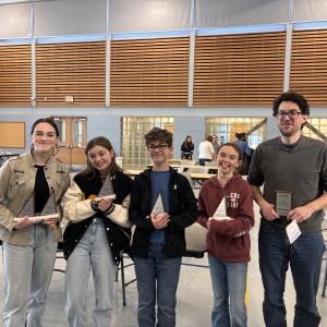 CTL students and coach are all smiles following their first place win at MathCounts regional competition. From left are Octavia Aurora, Fina Record, Charlie Record, Adeline Inman and coach Nick Record. Courtesy of CTL CTL math team and coach