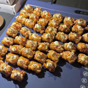 Lori Mitchell of Boothbay Craft Brewery shares her award-winning pretzel lobster bite at Chef Summit. Courtesy of Lori Mitchell