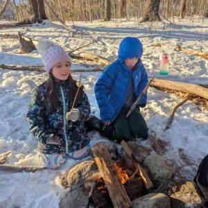 Rylee Libby and Jaxon Christ build a fire and friendship at GSB Outing Club with Hearty Roots. Courtesy photo Rylee Libby and Jaxon Christ