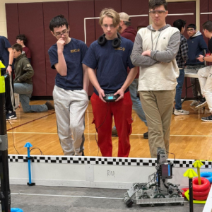 Brandon Seigars, Lucian Stoddard, and Anthony Angelico think about their strategy before one of their qualifying matches on Saturday in Monmouth. Courtesy of Kristen Hanley