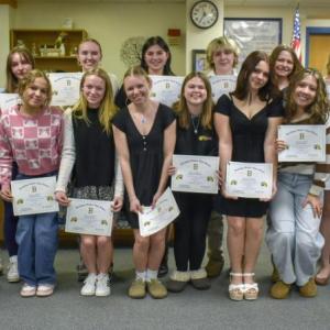 The Boothbay Region High School cheerleading team. Top row, from left to right: coach Madeleine McLellan, Maya Jacobs, Bailey Lewis, Skyla Carrier, Titan Lewis, Izzy Andreason, Brianna Campbell and coach Michele Barter. Bottom row: fans Brody Campbell and Gabe Andreason, Ariyah Green, Olivia Ritall, Maddie Andreason, Abigail Babineau, Gabby Crowell and Sarah Harris. FRITZ FREUDENBERGER/Boothbay Register. 