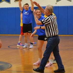 Before the opening tip, referee Clayton Pottle calls a technical foul on Korey Lewis for "indecent exposure." KEVIN BURNHAM/Boothbay Register