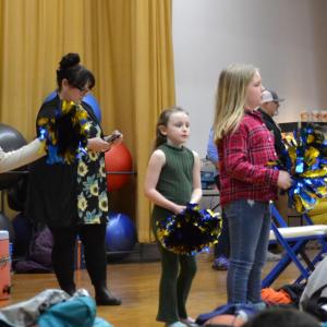 Cheerleaders on the stage. KEVIN BURNHAM/Boothbay Register