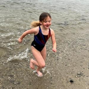 A Leprechaun Leap participant comes out of the water. Courtesy of Toby LeConte