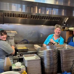 Joanna Breen, Samantha Fields and Buzz Makarewicz in the kitchen at Community Lunch. Lisa Hallinan photo