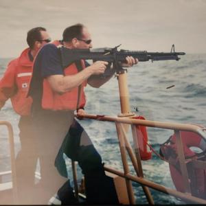 MK2 Brian Blethen in the foreground and GM2 Robert Ames in the background, re-qualifying on station weapons, on Sept. 13, 2001. Courtesy of Brian Blethen