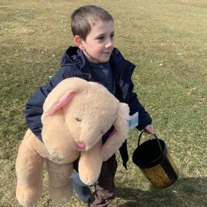 Wiscasset’s Sam Renzi, then 8, returns to his family after winning a stuffed bunny at last year’s Easter egg hunt at the Wiscasset Middle High School track. File photo Wiscasset’s Sam Renzi, then 8, returns to his family after winning a stuffed bunny at last year’s Easter egg hunt at the Wiscasset Middle High School track. File photo