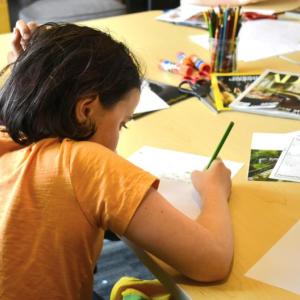 Elementary schoolers flex their storytelling chops at BHML's writing exploration club. ISABELLE CURTIS/Boothbay Register