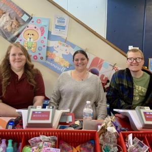 Volunteers keep things running smoothly at BRES' annual book fairs. From left, Katrina Densmore, Shannon Leeman and Cameron Holbrook. ISABELLE CURTIS/Boothbay Register