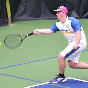 Boothbay junior Griffin Yereance tracks down the ball during his second singles match, which he won, 10-6, against Winthrop. KEVIN BURNHAM/Boothbay Register