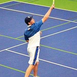 Seahawk sophomore Cole Hyson makes an over-the-head return during his doubles match against Winthrop May 7. He and partner Harry Hinckley won, 10-4. KEVIN BURNHAM/Boothbay Register