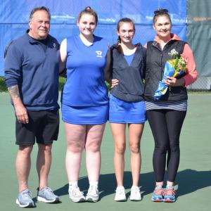 Seahawk senior girls tennis players Ivory Cody and Laura Chapman stand with their parents after being honored before the team's final home match on May 14. Pictured from left are David Cody, Ivory Cody, Laura Chapman and Kristie Chapman. KEVIN BURNHAM/Boothbay Register
