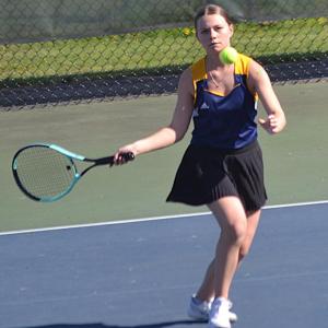 Izzy Andreasen, playing third singles, gets a good look for a return on May 14 against Spruce Mountain. KEVIN BURNHAM/Boothbay Register