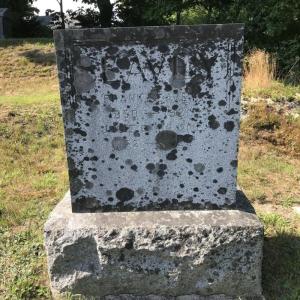 A before picture of a headstone before cleaning. Sara Fahnley photo