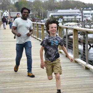 A young attendee races to the finish line during Bigelow Laboratory's 9th annual Fun Run & Walk for Colorectal Cancer Awareness. ISABELLE CURTIS/Boothbay Register