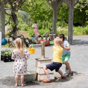 Children playing in the Alfond Children's Garden. Courtesy of CMBG