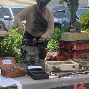 Steve Lenhardt brought his business, Black Spot Guild, to this year's Windjammer Days celebration. BILL PEARSON/Boothbay Register coin man