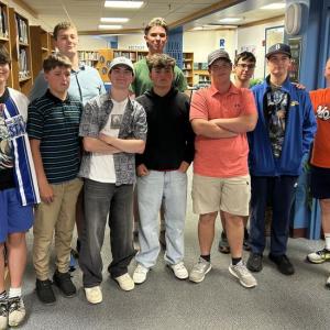 The 2025 BRHS boys tennis team at the team's awards night June 10. Pictured from left are, front: Ronan Drage, Avery Fowlie, Cleyton Splaine, Alex Ross, Griffin Yereance, Cole Hyson and coach Mark Gorey; back: Neal Baldwin, Harry Hinckley and Elijah Smith. KEVIN BURNHAM/Boothbay Register BRHS boys tennis
