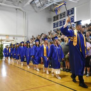 BRHS Class of 2025 class marshal Neal Baldwin leads his classmates into the gym for Graduation ceremonies on Friday, June 6. FRITZ FREUDENBERGER/Boothbay Register 