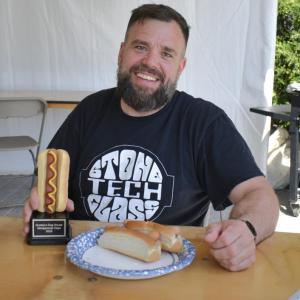 Matt Stefanilo beat the contest's prior record after eating 13 hot dogs in eight minutes. ISABELLE CURTIS/Boothbay Register