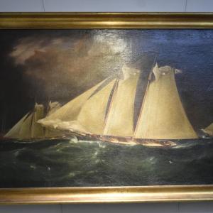 At East Boothbay Trading Co. - James Edward Buttersworth painting of an America's Cup Race.