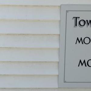 Another sign will soon be joining others hung on the Southport municipal building. BILL PEARSON/Boothbay Register handicapped