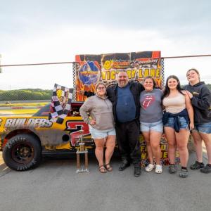 Joe Harriman and family gather in Victory Lane following his first career win at Wiscasset Speedway.  Jasen Dickey photo 