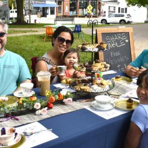 Don't be late for a very important date! Guests got treated to an outdoor tea party July 11 in honor of BHML's 101th birthday.  ISABELLE CURTIS/Boothbay Register