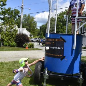 Charlie Stanley, with the Freedom Riders Association, went swimming frequently in the dunk tank. FRITZ FREUDENBERGER/BOOTHBAY REGISTER