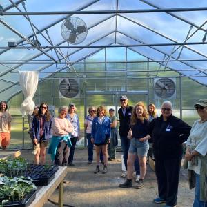 Touring Veggies to Table greenhouse. Erica Berman photo