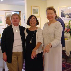 Artist Andrea Peters, center, and friends showing off (Christine Peters) jewelry. Courtesy of Andrew Gleason