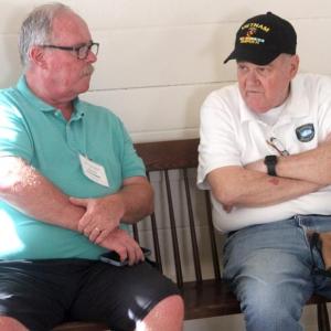 Boothbay Register Editor Kevin Burnham talks with columnist Joe Gelarden. STEVE EDWARDS/Boothbay Register