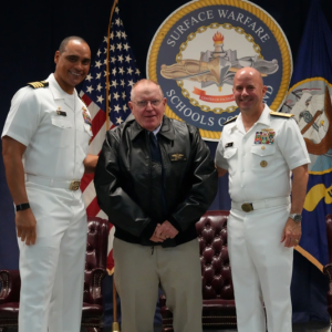Capt. (ret) Floyston "Bud" Weeks, stands with Adm. Jim Kilby, Acting Chief of Naval Operations, and Capt. Joe Baggett, SWSC Commanding Officer, at his retirement ceremony at SWSC Newport, Naval Station Newport, Rhode Island July 18. John Goulette photo Capt. (ret) Floyston "Bud" Weeks, stands with Adm. Jim Kilby, Acting Chief of Naval Operations, and Capt. Joe Baggett, SWSC Commanding Officer, at his retirement ceremony at SWSC Newport, Naval Station Newport, R.I., July 18, 2025. John Goulette photo