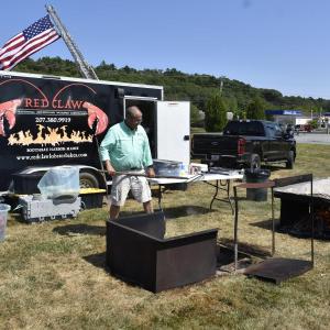 Tom Caron mans the cooking stations. FRITZ FREUDENBERGER/Boothbay Register