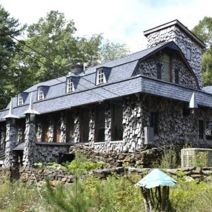 The Millennium Lodge stands out from its neighbors with its distinct Tolkien-inspired style. ISABELLE CURTIS/Boothbay Register