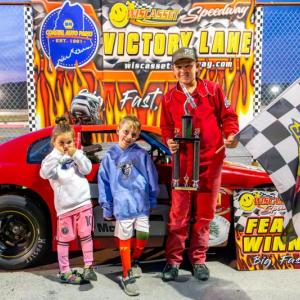Max Parlin and Jr. Officials Marley and Maverick Carter in Victory Lane. Jasen Dickey photo 