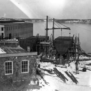 Sister ships Harvard and Bainbridge under construction at Rice Brothers Shipyard, circa 1921. Courtesy of Boothbay Region Historical Society