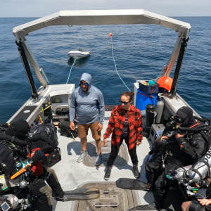 The team preparing for a second set of dives July 28 on ST Seiner. Left to right: Rick Simon, Tom Packer, Joe Mazraani, Jennifer Sellitti, Eric Takakjian, and Andrew Donn. Courtesy of Atlantic Wreck Salvage