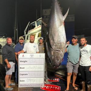 The Locked n Loaded team with their prize-winning 832-pound tuna. From left Bill Clifford, Charlie Mayrer, Nick Morley, Drew Meader, Andrew Morley, and Matt Burnham. Courtesy Sarah Morley. 