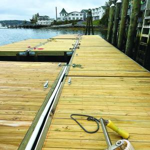 Placement of some of the completed floating docks. Remaining docks to be placed by the end of October. Photo by Maine Department of Corrections