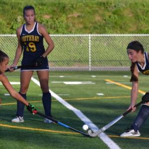 Zuri Smith and Lisbon's Bryn Chase battle for the ball. KEVIN BURNHAM/Boothbay Register
