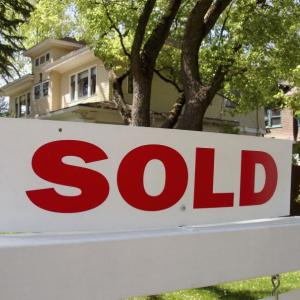 sold sign outside of a house.