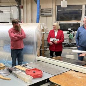 Boothbay Region High School STEAM Teacher Chip Schwehm, right, leads a tour of the shop classroom in 2024. FRITZ FREUDENBERGER/Boothbay Register