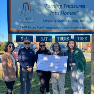 Members of 100+ Women Who Care Lincoln County Maine’s leadership team present Marilee Harris of Stepping Stones with an “Impact Donation” Courtesy photo