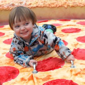 Austin Lewis riding on the Pier 1 Pizza bed, pre-races. STEVE EDWARDS/Boothbay Register
