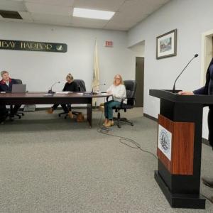 Shri Verrill, right, updates the Boothbay Harbor Selectboard on local climate resilience work Nov. 10. FRITZ FREUDENBERGER/Boothbay Register