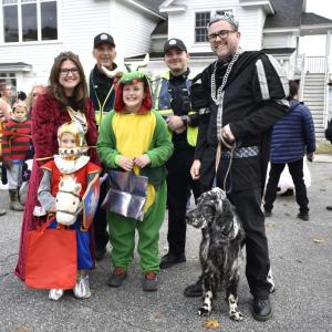 The Kurtz family led the parade this year. From left to right, Khristina, Jonah, Theo, Nate, and Archie the dog. Also pictured are BHPD officers Larry Brown and Ryan Potter. FRITZ FREUDENBERGER/Boothbay Register