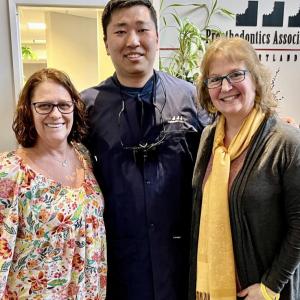 Christina with her brand-new smile stands with Dr. Bright Chang who with Oral Surgeon Dr. Matt Lawler donated $16,000.00 worth of treatment, and Mary Kamradt with Finding Our Voices who drove from Rockport to help celebrate. Photo supplied by Finding Our Voices 