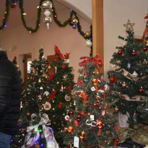 Holiday trees flew out the door during the Boothbay Region Garden Club's (BRGC) annual holiday event - just ask club member Laura Blake.  LISA KRISTOFF/Boothbay Register